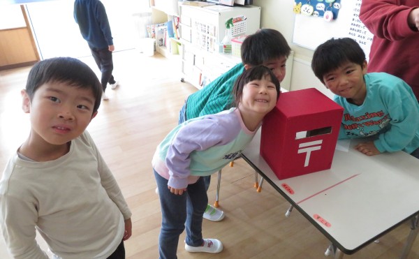 メッセージをポストに入れて